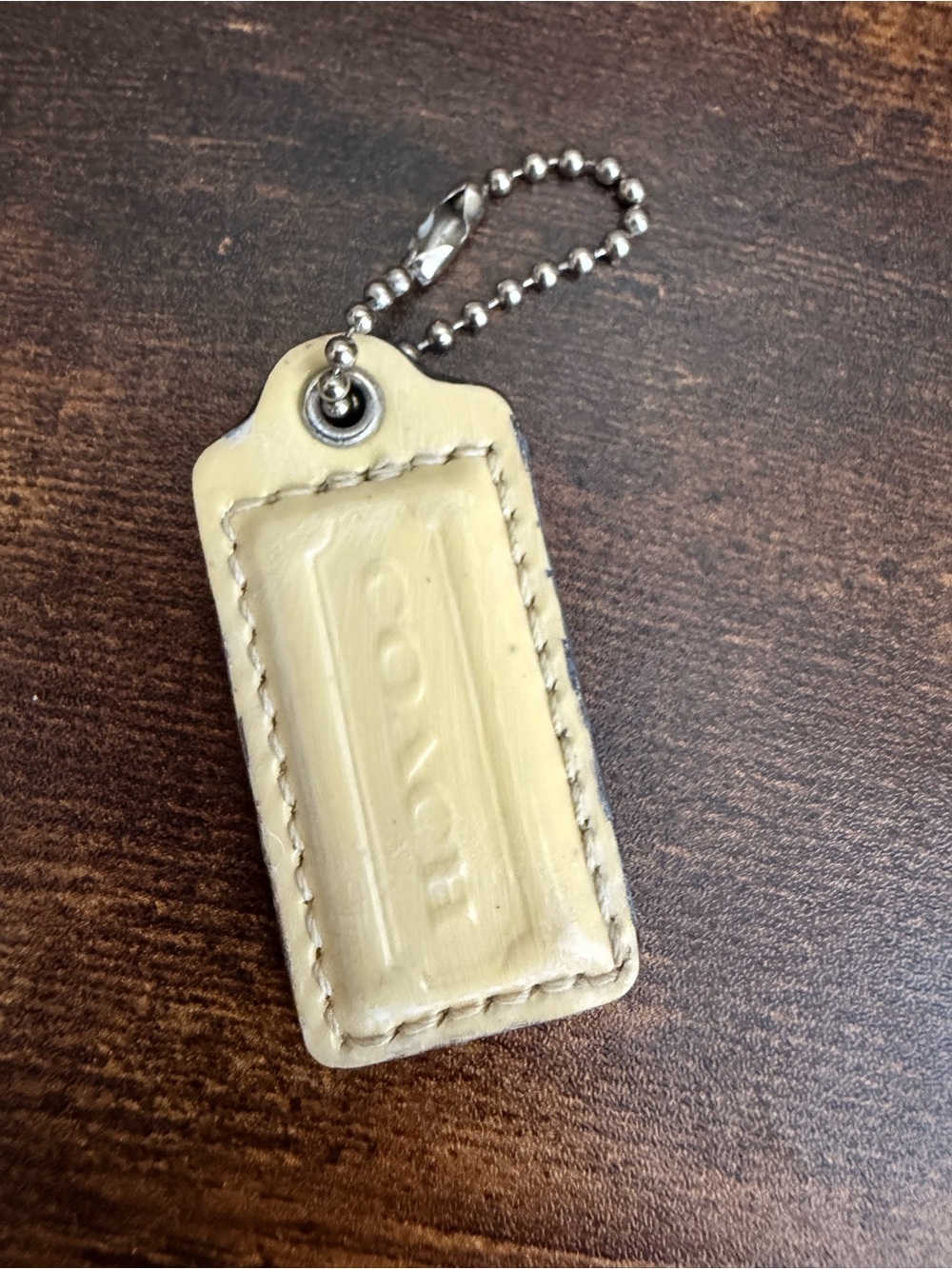 Coach Pale Yellow Leather Tag Keychain with Silver Ball Chain